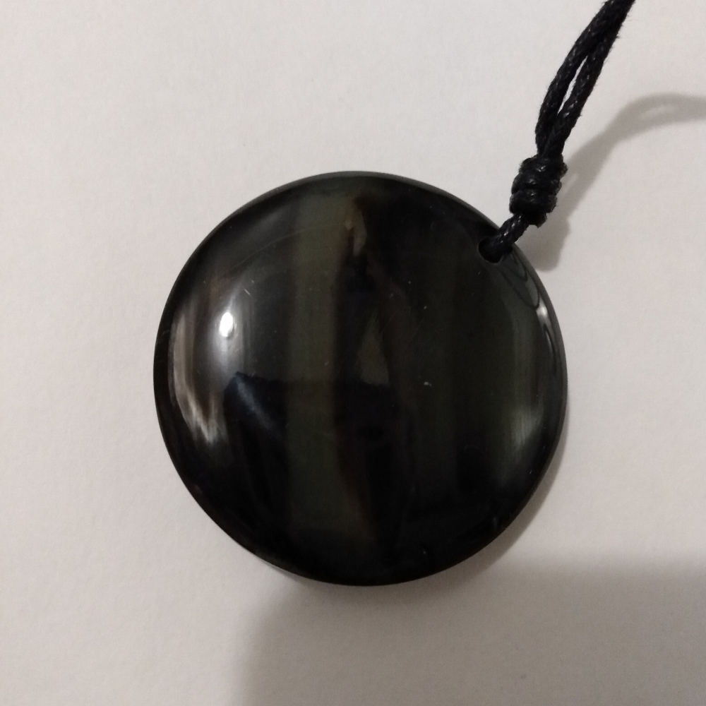 J. Jill round pendant made of upcycled horn with marbled appearance. Beautiful.